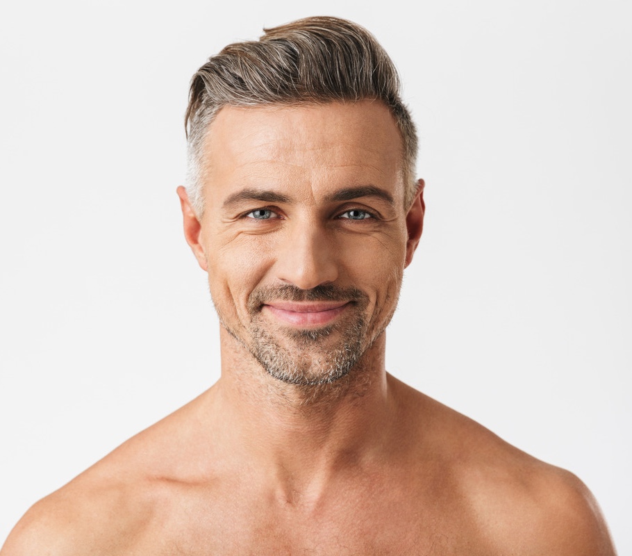 Photo of an older man with a full head of hair