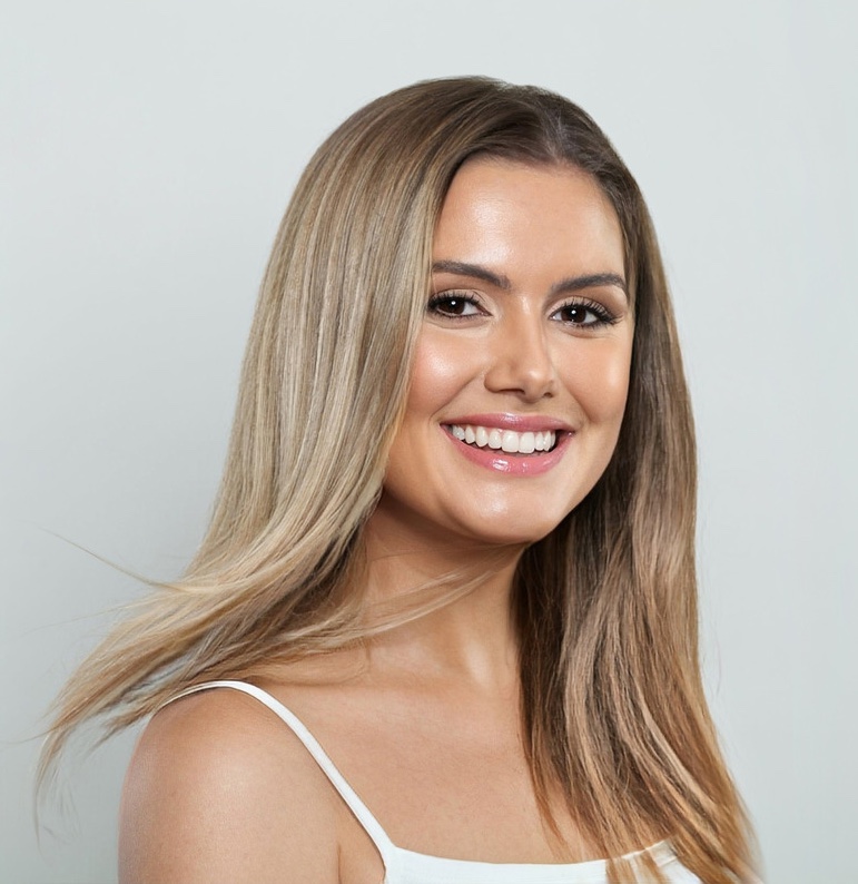 Photo of a smiling woman with great skin