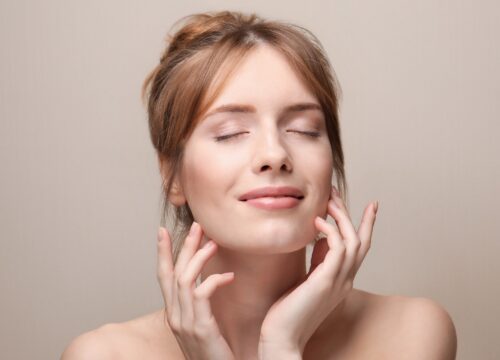 Photo of a woman with great skin after HALO® TRIBRID™ treatments